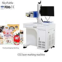 高速CO2レーザーマーキングマシン 食品パッケージの日付とバッチ番号の彫刻