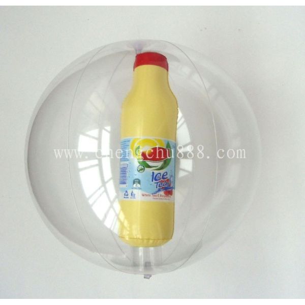 Inflatable beach ball with bottle inside