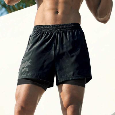 Short do Gym In1 dos homens 2 malham os esportes não tecidos com bolsos do fecho de correr
