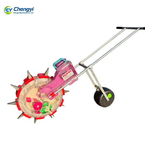 Heavy Duty Iron Hand Push Seeder Rust Resistant Coating For 4Kg Seed Capacity