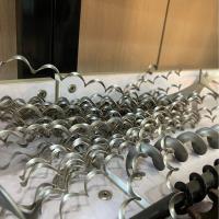Fácil de operar transportador de tornillo de acero manganeso de trabajo pesado transportador espiral cuchilla de acero inoxidable Construcción / equipo de transferencia de minería Partes de repuesto