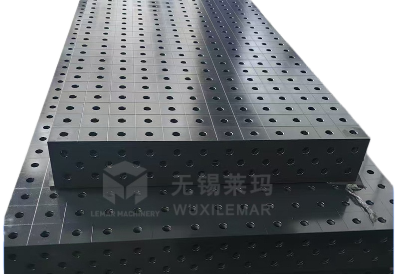 Professional modular welding table with grid hole pattern and accessories