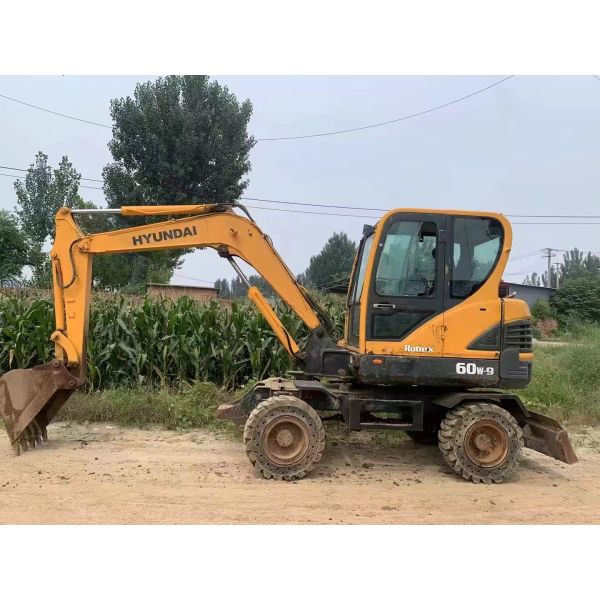 Подержанная машина для копания Hyundai 60W-9 с высотой копания 6070 мм