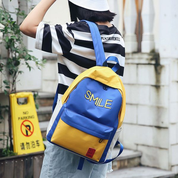 Large capacity men and women street shot stitching color backpacks fashion casual joker high school students bag tide
