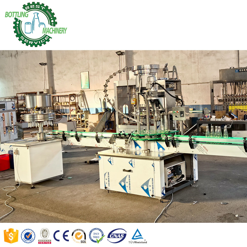 Semi Automatic Gravity Glass Bottle Wine Alcohol Beverage 12 Head Nozzle Rotary Bottling Machine