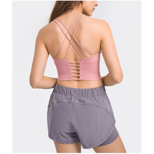 Разминка задней части Criss бюстгальтеров спорт женщин йоги Strappy проложила беспроводную верхнюю часть йоги