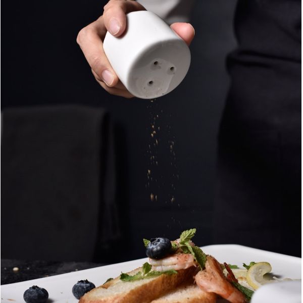 White Ceramic Salt And Pepper Shakers