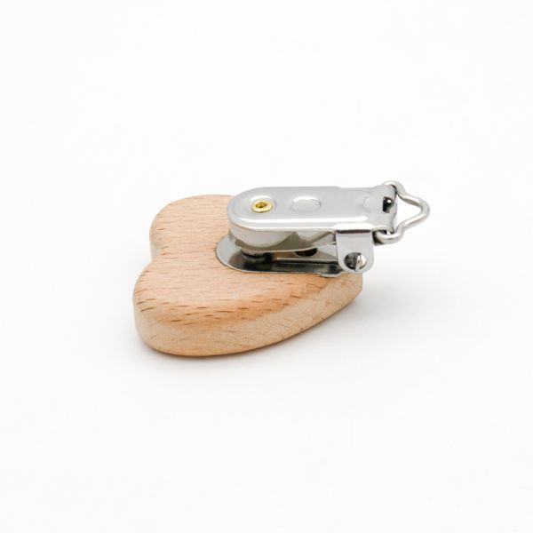 En bois, en forme ronde, des pinces pour sucettes pour bébé