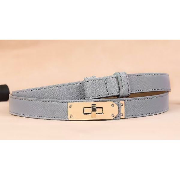 Adjustable belt, alloy buckle, leather texture, fashion accessory, minimalist design, skirt accessory, dress accessory