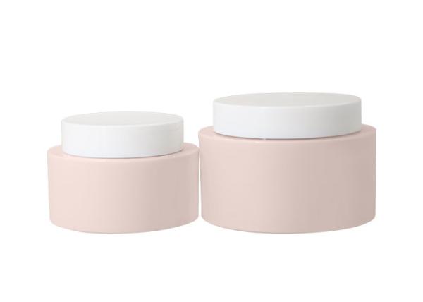 A capacidade cosmética Pp de 50g 100g desnata o frasco com o tampão de parafuso Leakproof