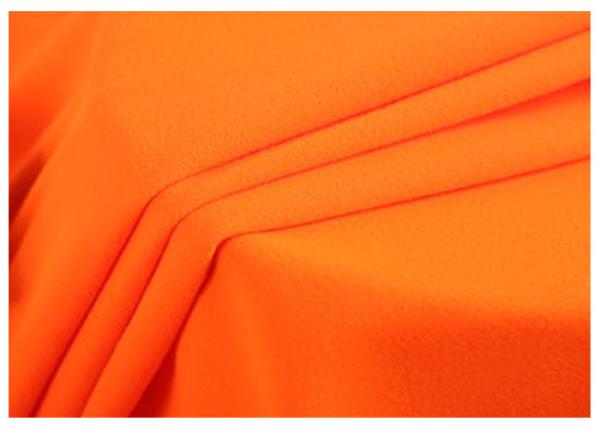 Sarja tecida 32X21 da tela algodão alaranjado fluorescente fino para a roupa do terno