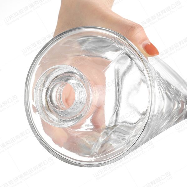 Type d'étanchéité Couvercle en verre Carré et cylindrique Vodka Bouteille en verre de vin pour jus de whisky