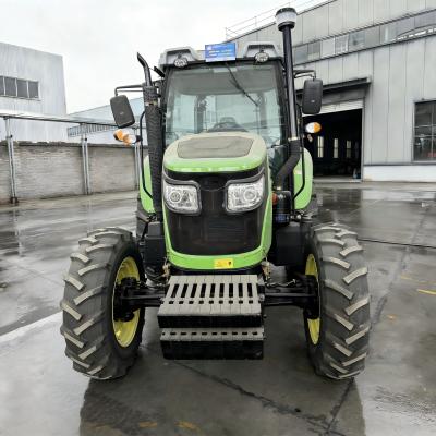 Versatile Four Wheel tractor built to handle plowing tilling hauling and other heavy farm chores with ease and reliability
