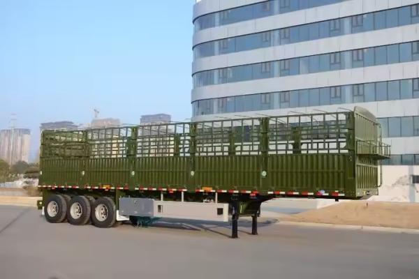 12400*2500*2000mm Curb Weight 7T 3 Axle 10pcs Leaf Spring 40T Payload Stake Semi Trailer