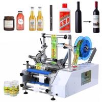 FK603 Machine manuelle semi-automatique d'étiquetage de bouteilles rondes en verre pour les emballages dans les boîtiers