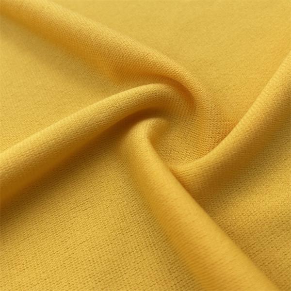 Tissu tricoté en polyester élastique à maillot unique avec une sensation de main douce