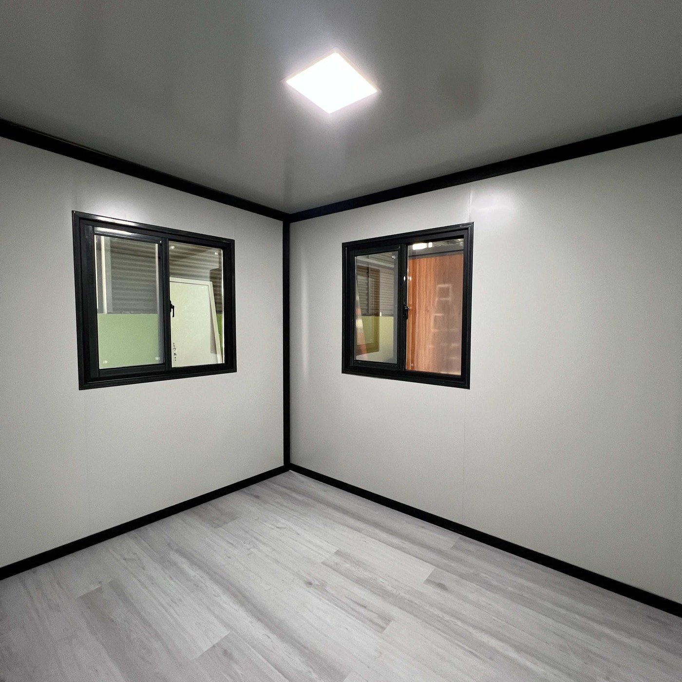 20ft Expandable Container House with Grey Cladding, Black Frame and Fitted Interior