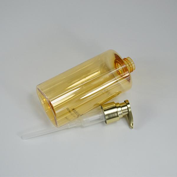 PP Material Plastic Bottle Pump Lotion Dispenser with UV Coating and Matt Gold Collar