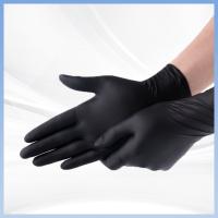 O preto Textured luvas estéreis descartáveis do nitrilo para o laboratório dos cuidados médicos