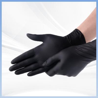 O preto Textured luvas estéreis descartáveis do nitrilo para o laboratório dos cuidados médicos