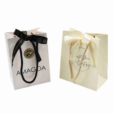 FSC 250gsm Cosmetics Perfume Shopping Printed Paper Gift Bags With Ribbon Handles
