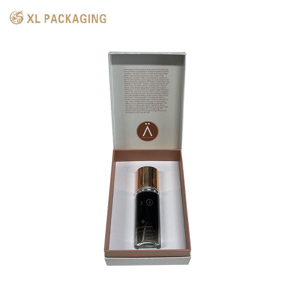 Hinged Cosmetic Paper Box with Rose Gold Foil Stamping Custom Flocked Foam Liner and Matte Metallic Paper for Skincare Packaging