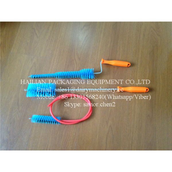 La machine à traire épargne la brosse de nettoyage pour l'usage de ferme de vache avec la couleur orange