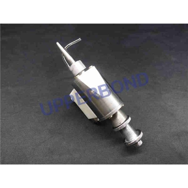 Unidad de pegado adhesiva del papel de cigarrillo para la adherencia de papel montada