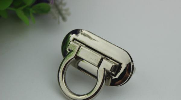 Popular fashion simple design oval shape zinc alloy nickel color metal locks for handbag
