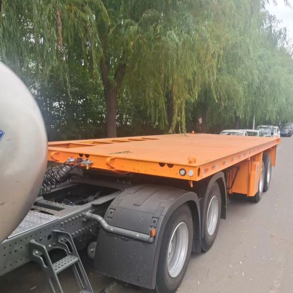 CIMC nuevo 4 Ejes 80-100 toneladas uso para el transporte de equipos pesados maquinaria y cargas de gran tamaño contenedor de cama plana semi-camión remolque