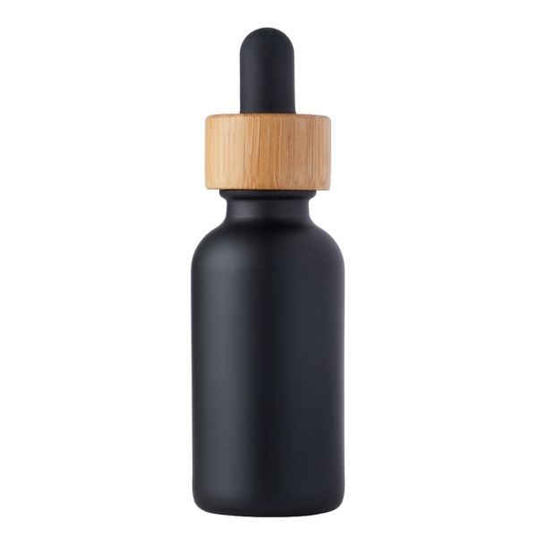 Чернота K1011 покрыла круглый опарник стеклянных бутылок с бамбуковой крышкой капельницы