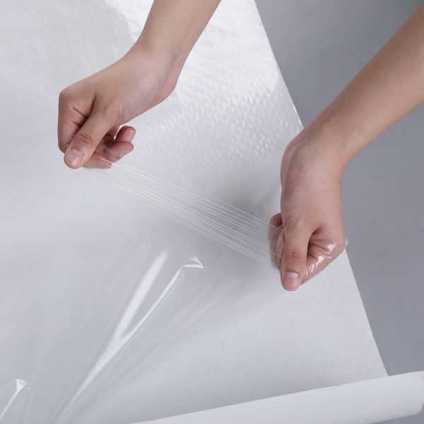 Процесс безшовного бюстгальтера скрепляя горячий плавит склеивающие пленки превращает в желе свернутый спиралью клей