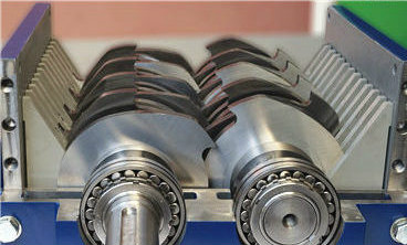 Double Shaft Shredder with Six-fold Seal Helix Tool Arrangement and Hexagonal Cutter Design for Efficient Metal Shredding