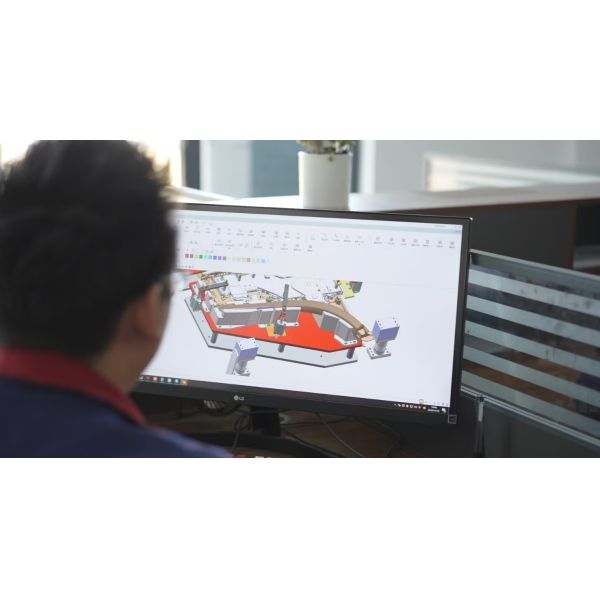 Dual Robot Clip Insertion Cell For Automotive Parts Assembly