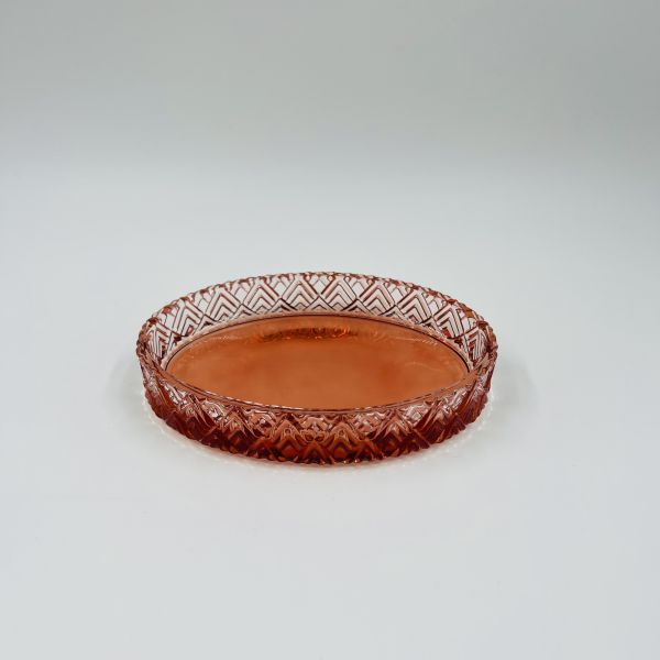 Les accessoires de salle de bains en verre orange de luxe ont une forme ronde avec un motif diamanté