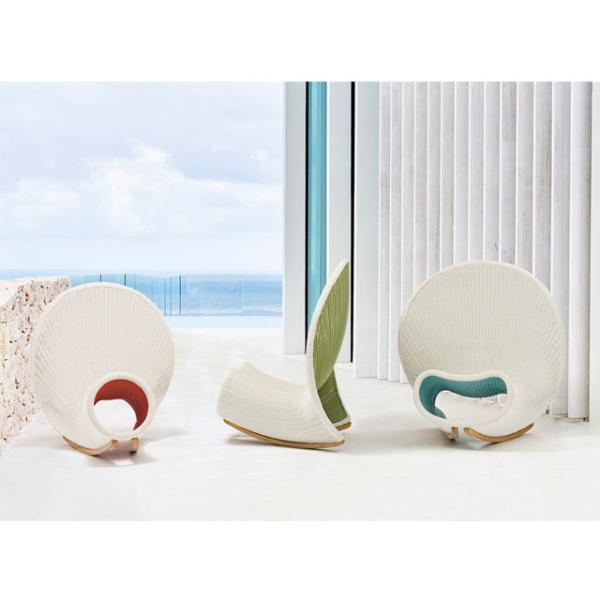 Experience Comfort and Style with this Modern Rattan Lounge Chair in Special Shell Shape