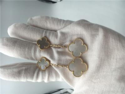 Van Cleef Brinco com 2 motivos, brincos da madrepérola de Van Cleef do ouro 18k amarelo
