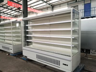 Refrigerador aberto pesadamente carregado da exposição da prateleira, mostra aberta do supermercado do refrigerador