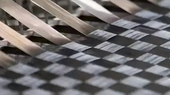 Resin-Compatible Carbon Fiber Spread Tow Fabric for Aerospace and Automotive Applications