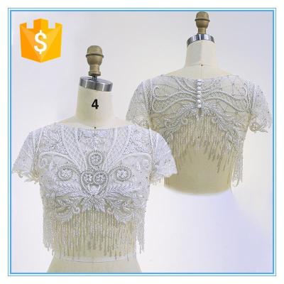 Blusas e blusas de noiva cortas e elegantes, bordados com contas, à venda.