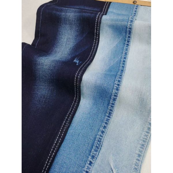Tejido denim de 8oz con hilo Siro de spandex débil, cruzado y con motas, construcción 12+12*21/40 para vaqueros o abrigo de denim