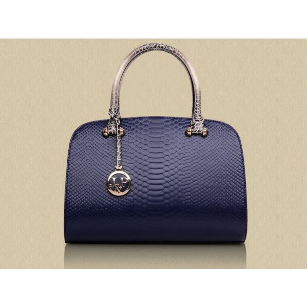 2016 new European and American fashion handbags serpentine Messenger bright skin handbag luxury handbag