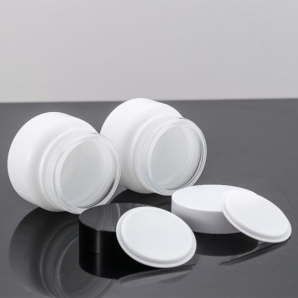 Stock Luxury Skin Care Glass Jar 50g Empty Frosted Cosmetic Packaging with Black Lid and Glass Bottle Plastic Cap White Disc