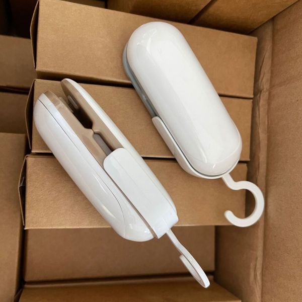 Запечатывающий полиэтиленовые пакеты мини-пакеты, запечатывающие и режущие для портативного бумажного упаковочного материала