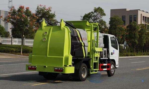 No Problem Pure Electric Dongfeng 4x2 Lifter Truck Efficiently Handles 6CBM Kitchen Garbage Containers