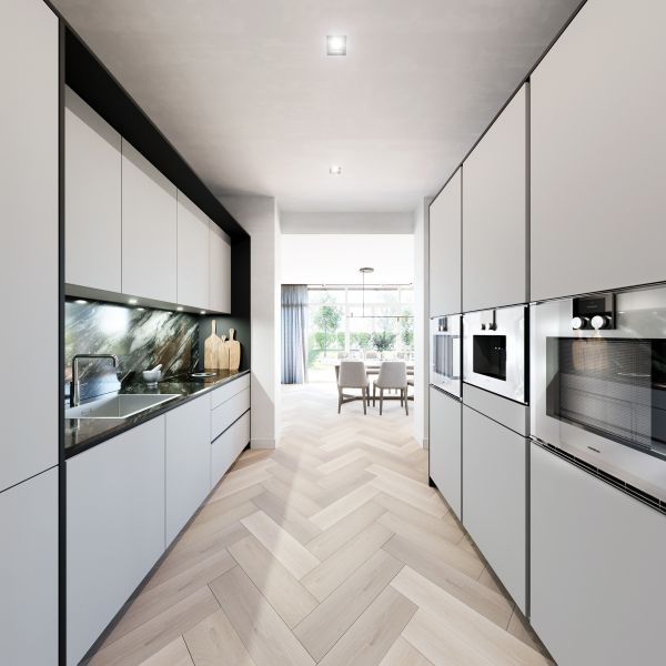 El gabinete de cocina moderno de lujo y el mostrador de mármol