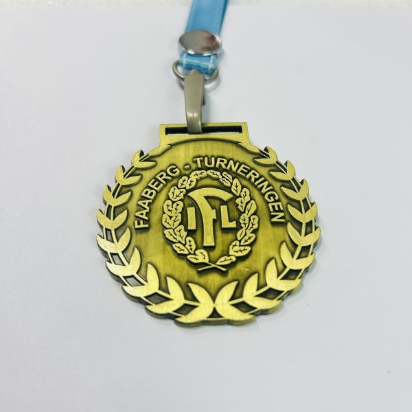 Soft enamel metal medals crafted using die cast process available in gold silver copper and antique finishes for various occasions
