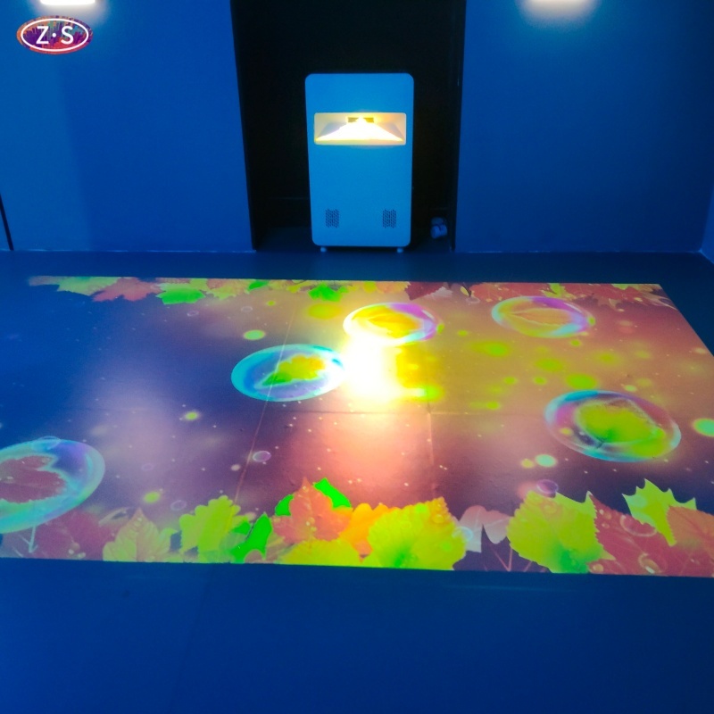 Portable Motion Sensing Projection Game System for Floor and Wall Interactive Play