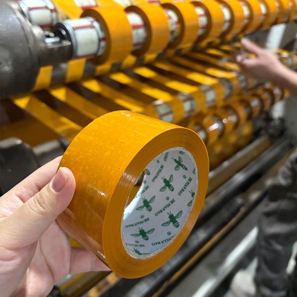 50μ Thickness Yellowish Packaging Tape 55mm X 150y For Carton Sealing