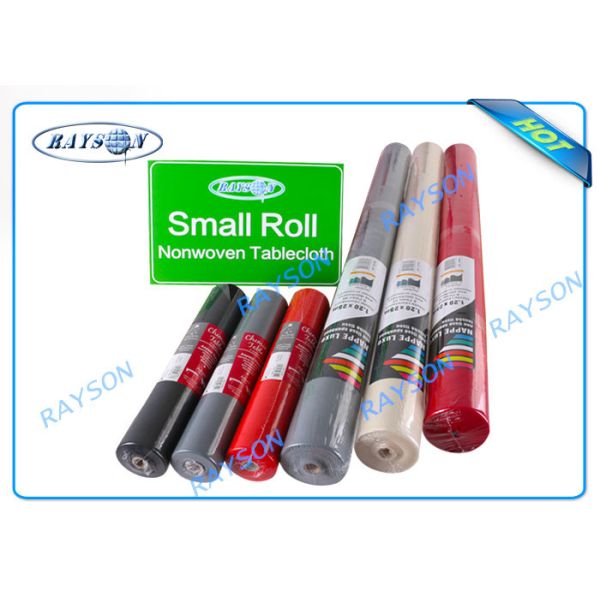 緑の赤い黄色の非編まれたテーブルクロス、ビニールのテーブル掛けのナプキン
